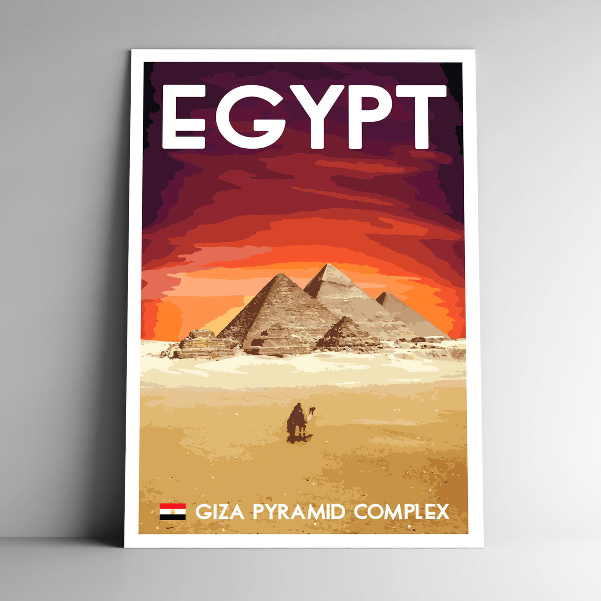 RETRO-STYLE EGYPT TRAVEL POSTER FEATURING THE GREAT PYRAMIDS OF GIZA BENEATH A DRAMATIC ORANGE AND RED SUNSET SKY.