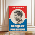 FRAMED VINTAGE-STYLE JOHN F. KENNEDY PRESIDENTIAL CAMPAIGN POSTER FEATURING A RED, WHITE, AND BLUE DESIGN WITH “KENNEDY FOR PRESIDENT” TEXT.