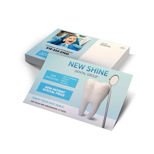 STACK OF CUSTOM PRINTED DENTAL POSTCARDS FEATURING A LIGHT BLUE AND WHITE DESIGN WITH TOOTH GRAPHICS AND CONTACT INFORMATION ON A CLEAN WHITE BACKGROUND.
