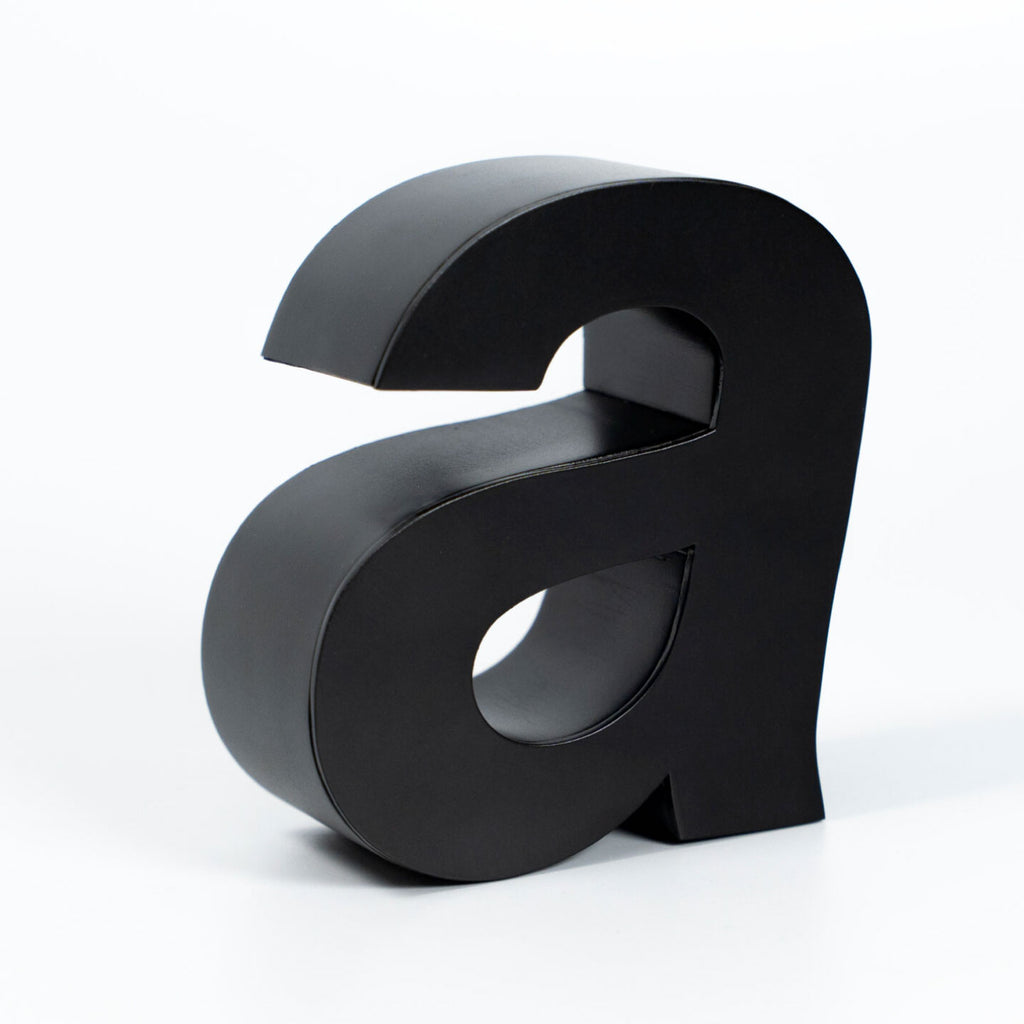 MATTE BLACK FABRICATED 3D LETTER “A” WITH A DIMENSIONAL FINISH, DISPLAYED ON A CLEAN WHITE BACKGROUND.