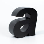 MATTE BLACK FABRICATED 3D LETTER “A” WITH A DIMENSIONAL FINISH, DISPLAYED ON A CLEAN WHITE BACKGROUND.