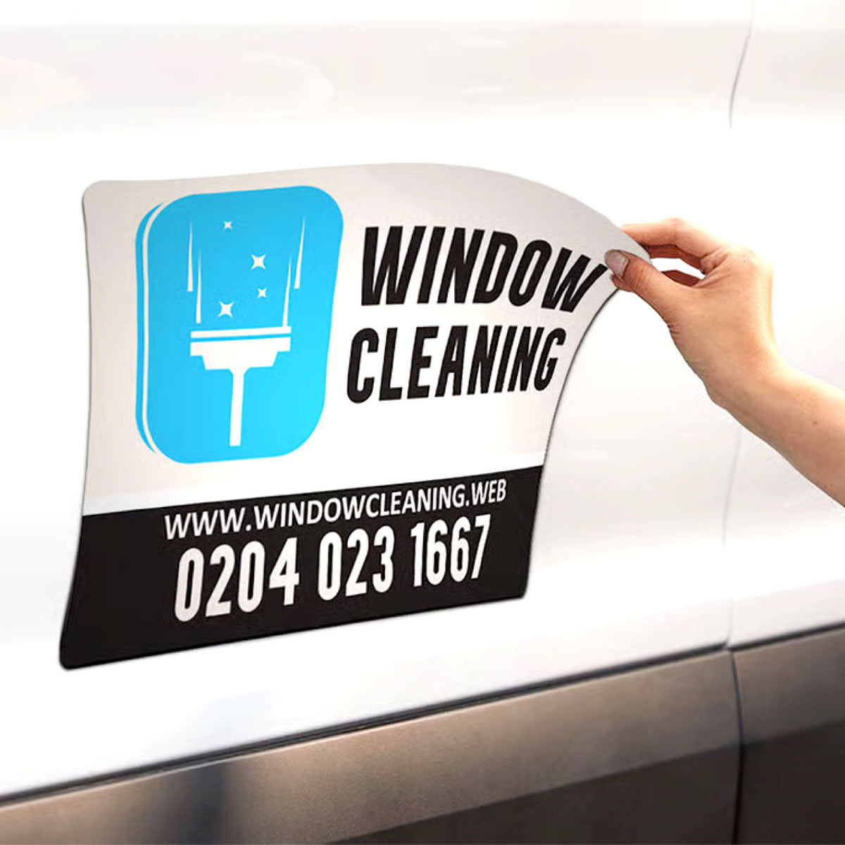 CUSTOM PRINTED VEHICLE MAGNET SIGN FEATURING WINDOW CLEANING BUSINESS BRANDING, LOGO, AND CONTACT INFORMATION, APPLIED TO THE SIDE OF A WHITE CAR FOR REMOVABLE BUSINESS ADVERTISING.